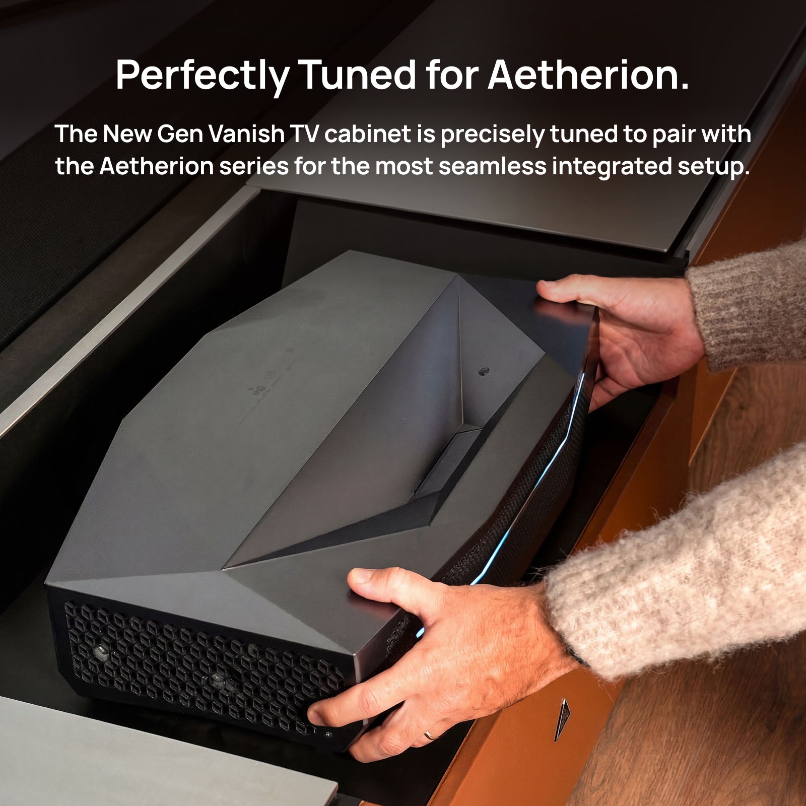 AWOL Vision New Gen Vanish TV Cabinet paired with Aetherion, showing its tuned fit for a seamless integrated UST projector setup.